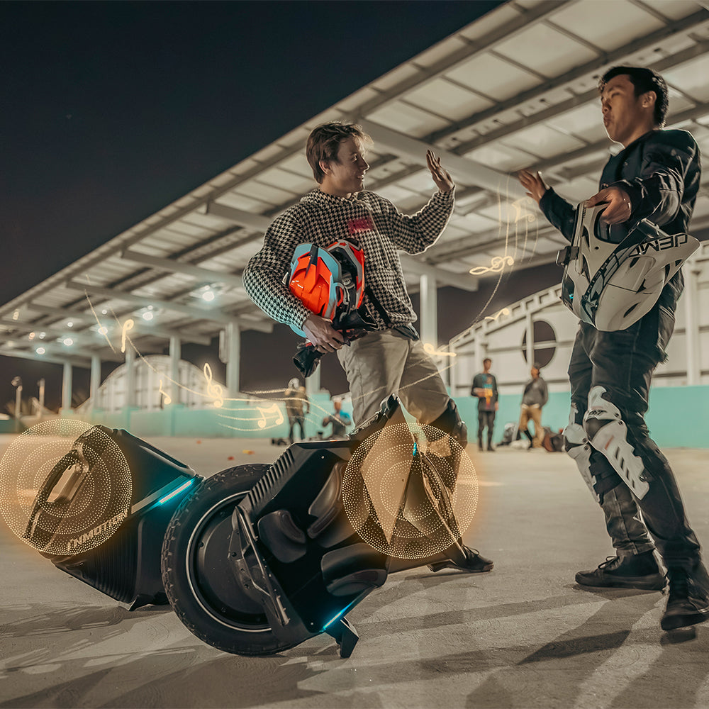 Two people interact near a V12S electric unicycle at night, with musical notes and lights adding a dynamic vibe.